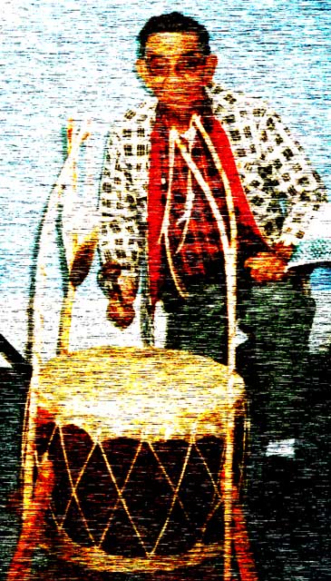 Howard Paul drums in Tobique reserve Kahentinetha Bear asks what? why?